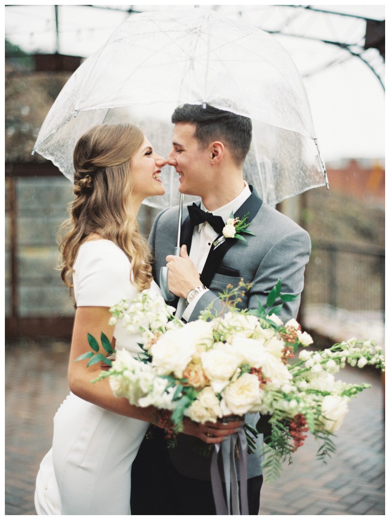 bride and groom outside in rain at the standard knoxville, tn