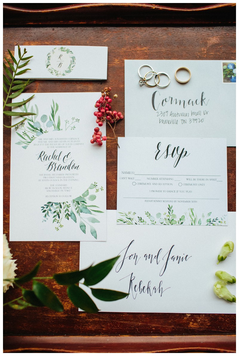flat lay of invitation suite for Winter Wedding at The Standard Downtown Knoxville, wedding details