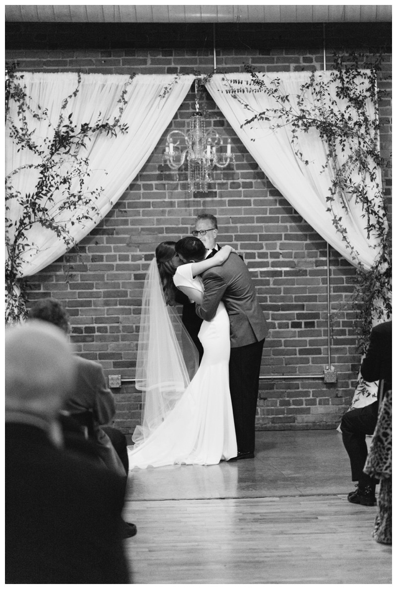 bride and groom kiss ceremony at the standard knoxville tn