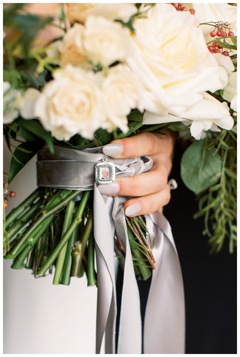 bridal bouquet with remembrance charm, wedding details