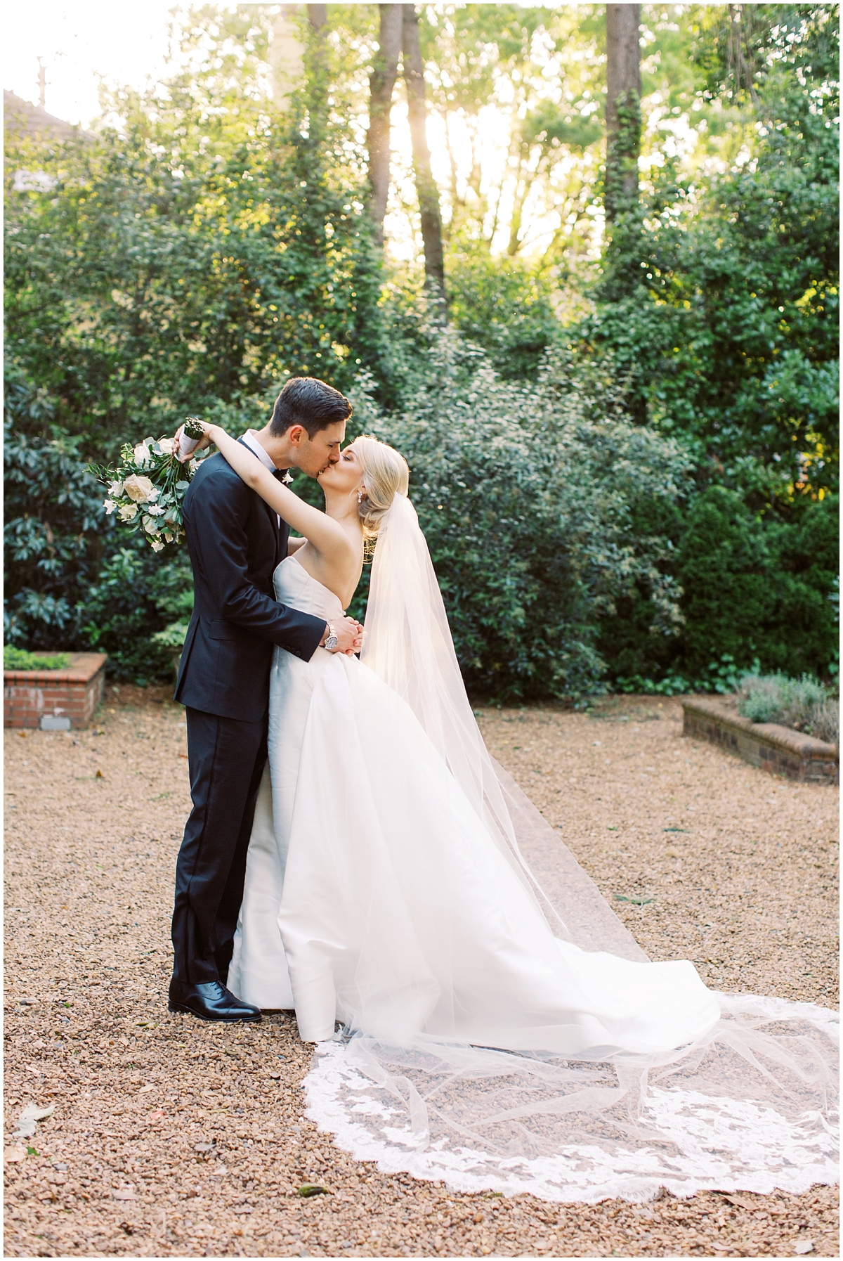 bride and groom kissing in the sun charlotte nc wedding