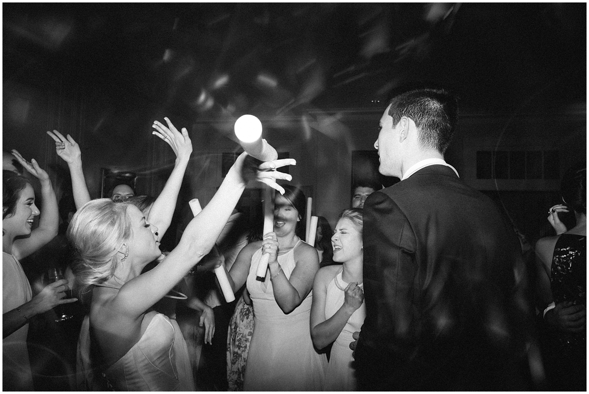 bride and groom dancing with guests at Duke Mansion wedding reception
