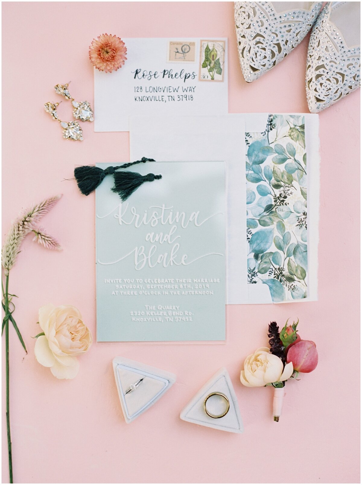 peach green and gold flatlay wedding details