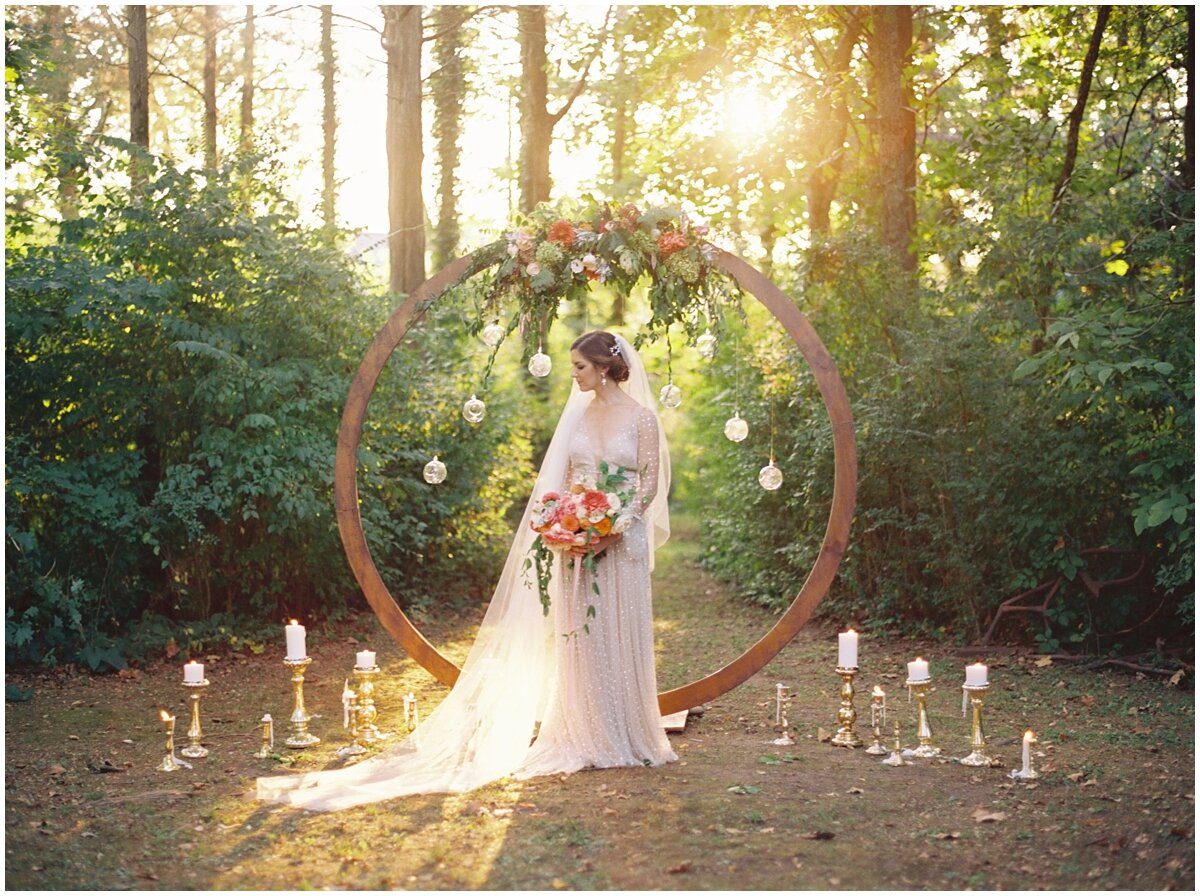 bridal portrait outdoor knoxville wedding ceremony in front of round arch and candles