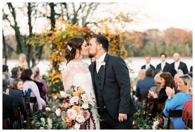 bride and groom kiss after ceremony at Marblegate Farm, Knoxville TN