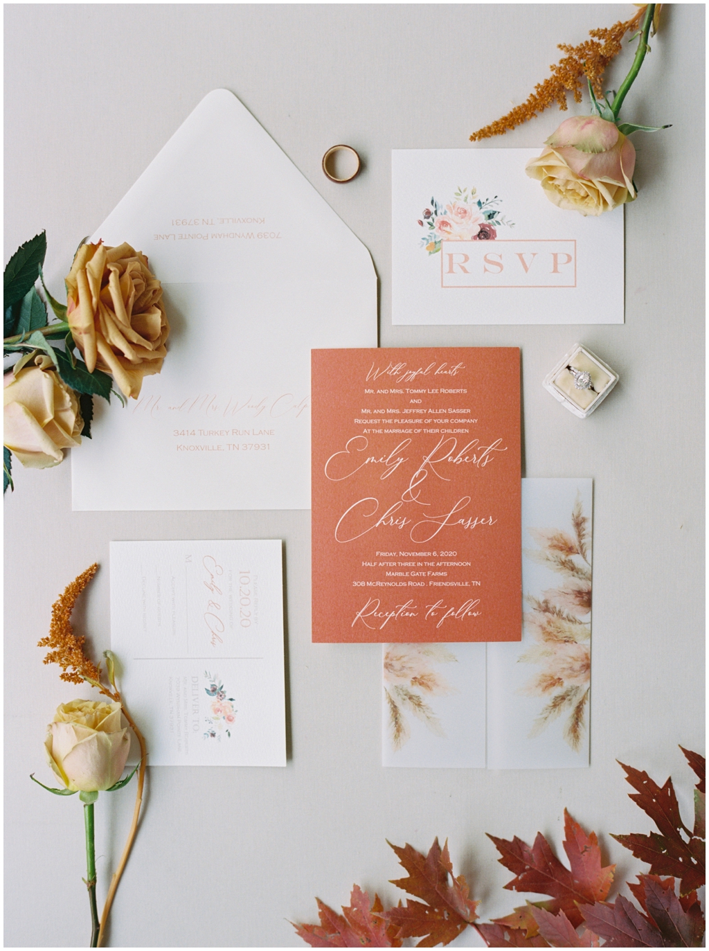 A fall inspired orange & muted yellows wedding invitation suite
