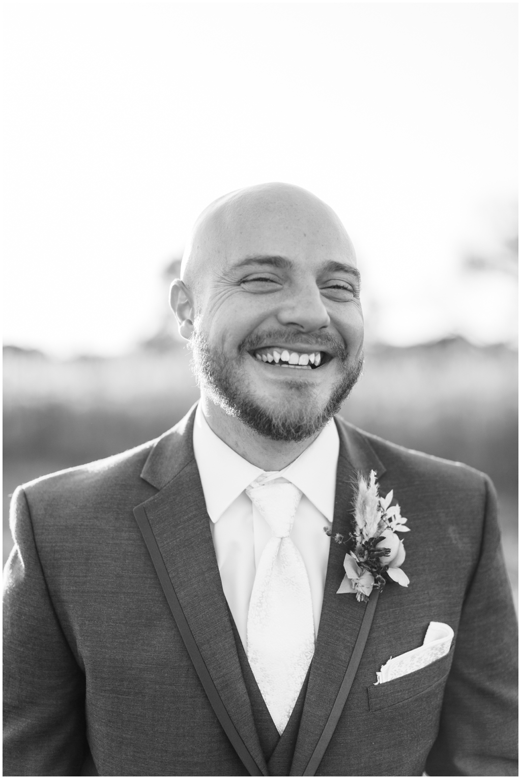 Black and white portrait of groom