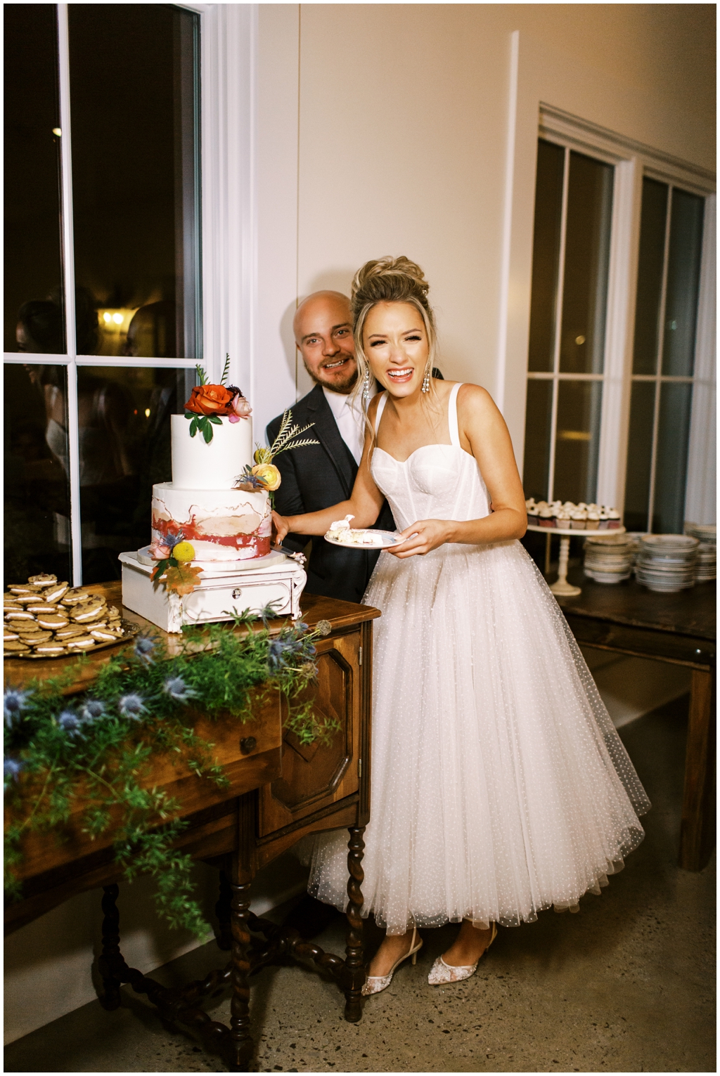 Emily Ann Roberts and Chris Sasser cut the cake at their wedding reception at Marblegate Farm. 