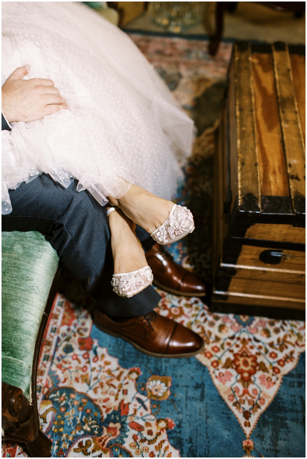 Detail shot of bride and grooms wedding shoes