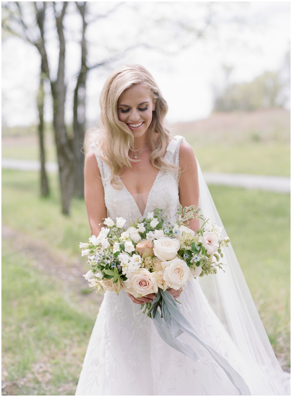 Charming neutral spring bridal bouquet by Thistle and Lace